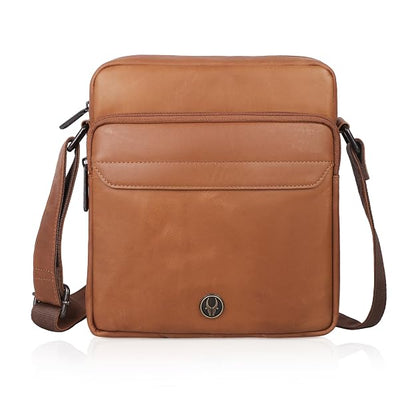 A brown leather crossbody bag with a front zippered pocket and an adjustable shoulder strap, shown on a white background with a subtle reflection.