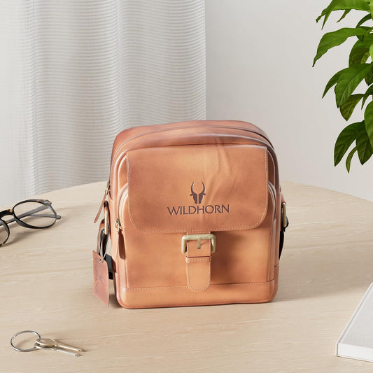 WildHorn genuine leather mini sling bag men tan vintage lifestyle shot side angle — bags.mu Mauritius