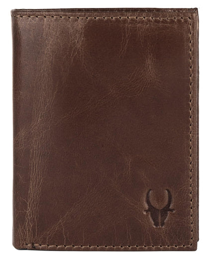 A brown leather bifold wallet with visible stitching and an embossed Wildhorn Logo in the bottom right corner, shown against a plain white background. Its available for sale in Mauritius